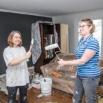 Family gathered around a table, engaging in active listening and effective communication at home