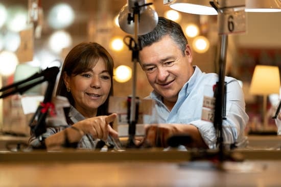 Two people proudly claim home energy improvements, saving money and the environment