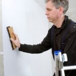 Step-by-step guide on how to improve surfing at home using online video tutorials and practice drills